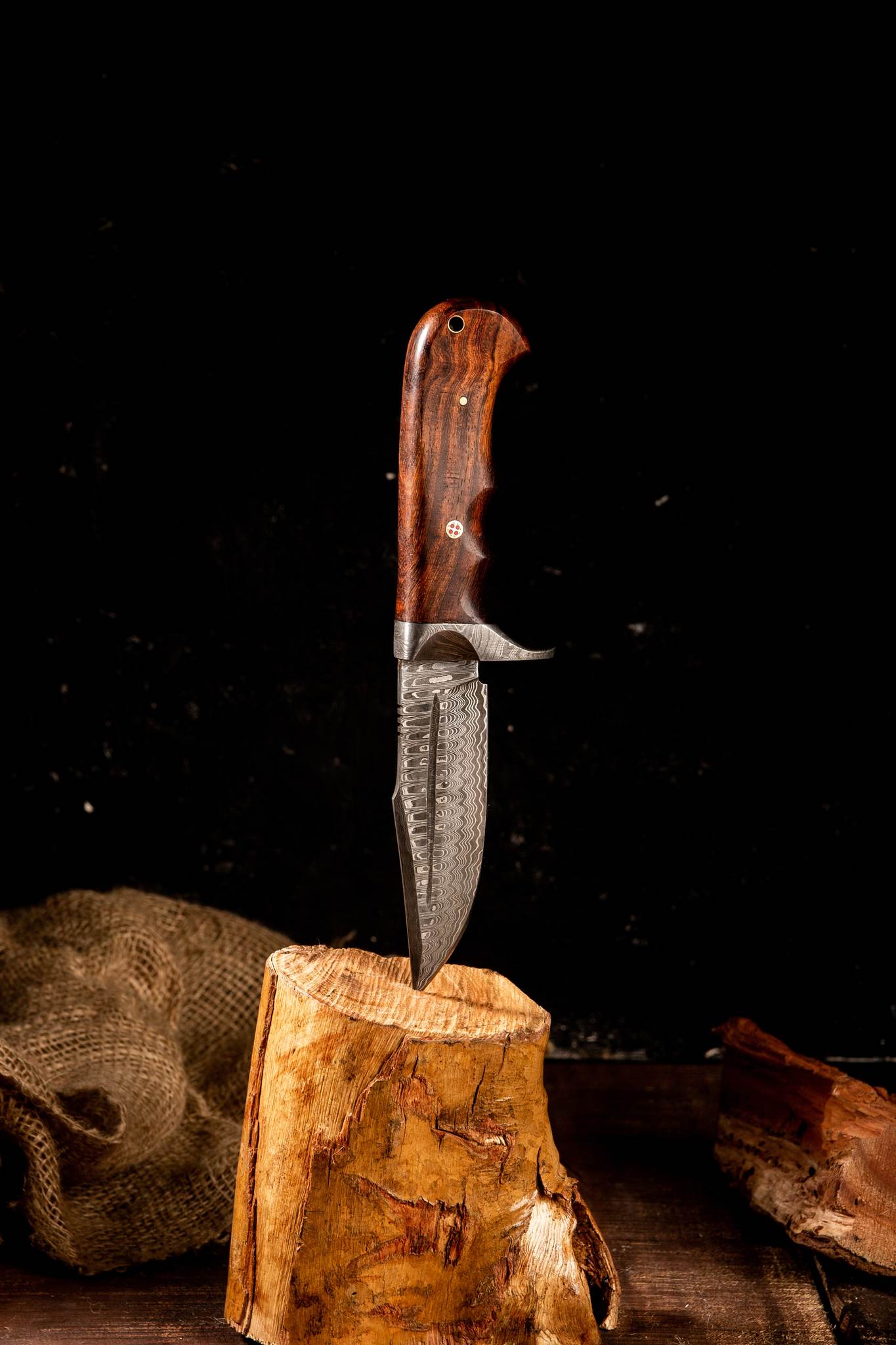 http://prodamascusknives.com/cdn/shop/files/1T2A0542-10_HandForgedDamascusSteelHuntingKnife-EverydayCarrySkinnerWithWoodHandle.jpg?v=1686564210